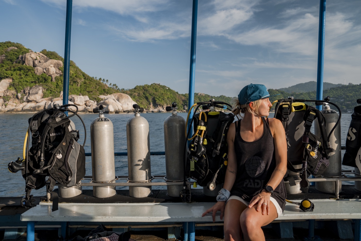 Diver on boat, golden hour